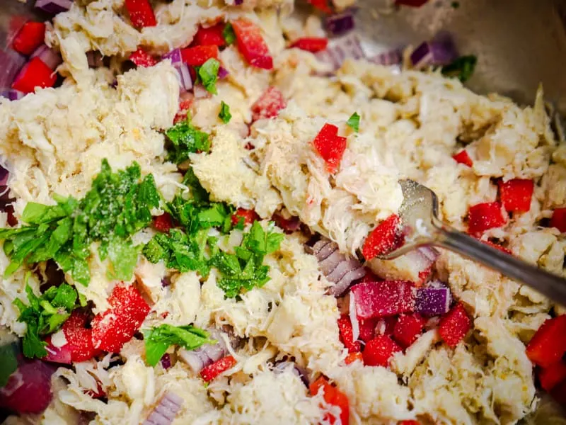 Mixing crab stuffing together