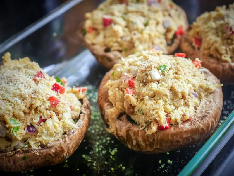 Stuffed Portobello mushrooms in a baking dish
