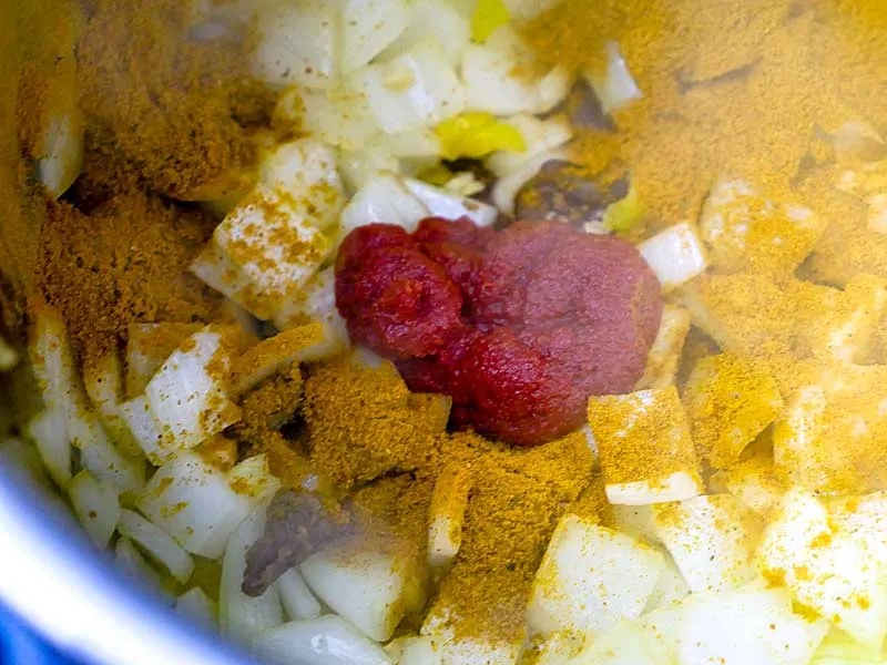 Browning tomato paste and curry