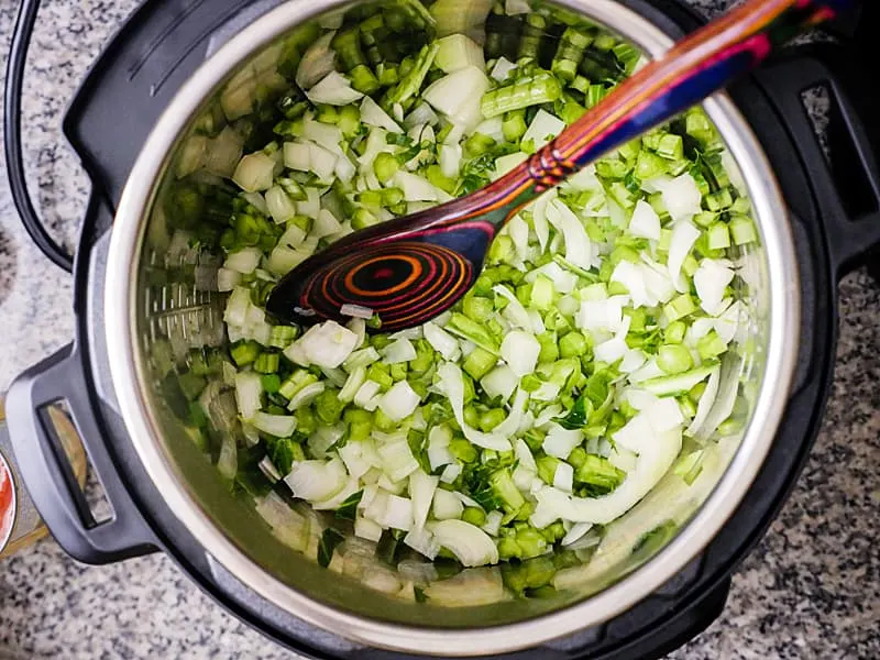 Sautéing onions and collard green stems in Instant Pot